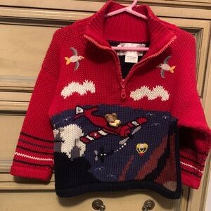 Red and Blue Kids Sweater with Airplane Design